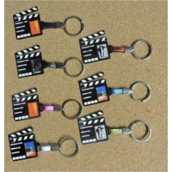 Porte clés métal Clap de cinéma avec doming personnalisable