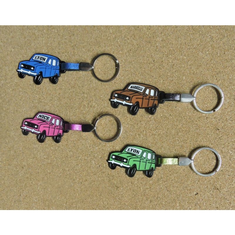 Porte clés forme 4L coloris assortis avec doming personnalisable 